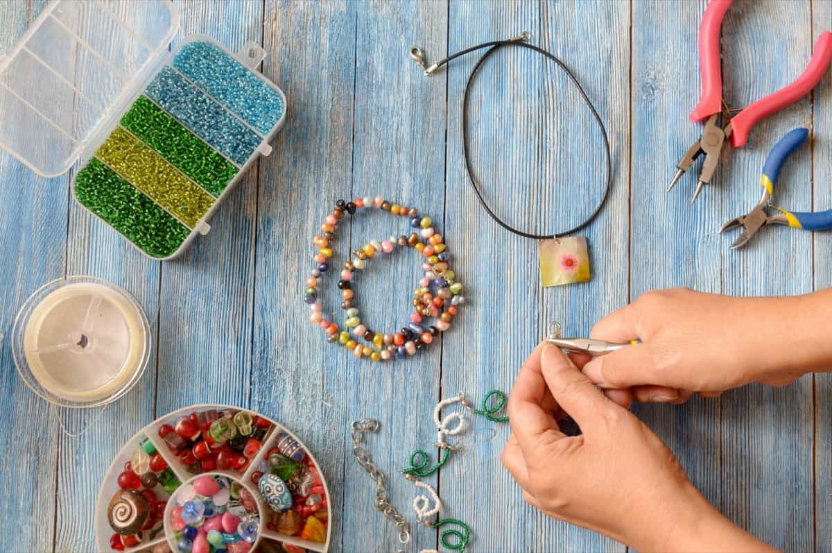 Woman making handmade jewelries